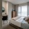 Bedroom with natural lighting and high ceilings