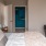 Bedroom with natural lighting and high ceilings